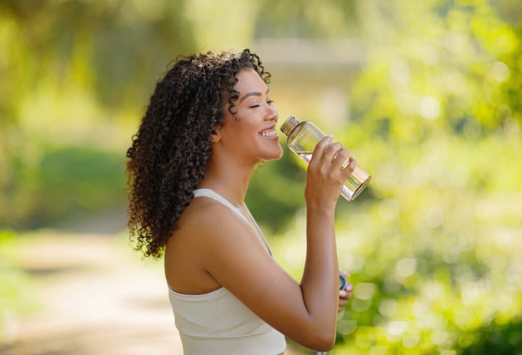 Woman drinking clean water
